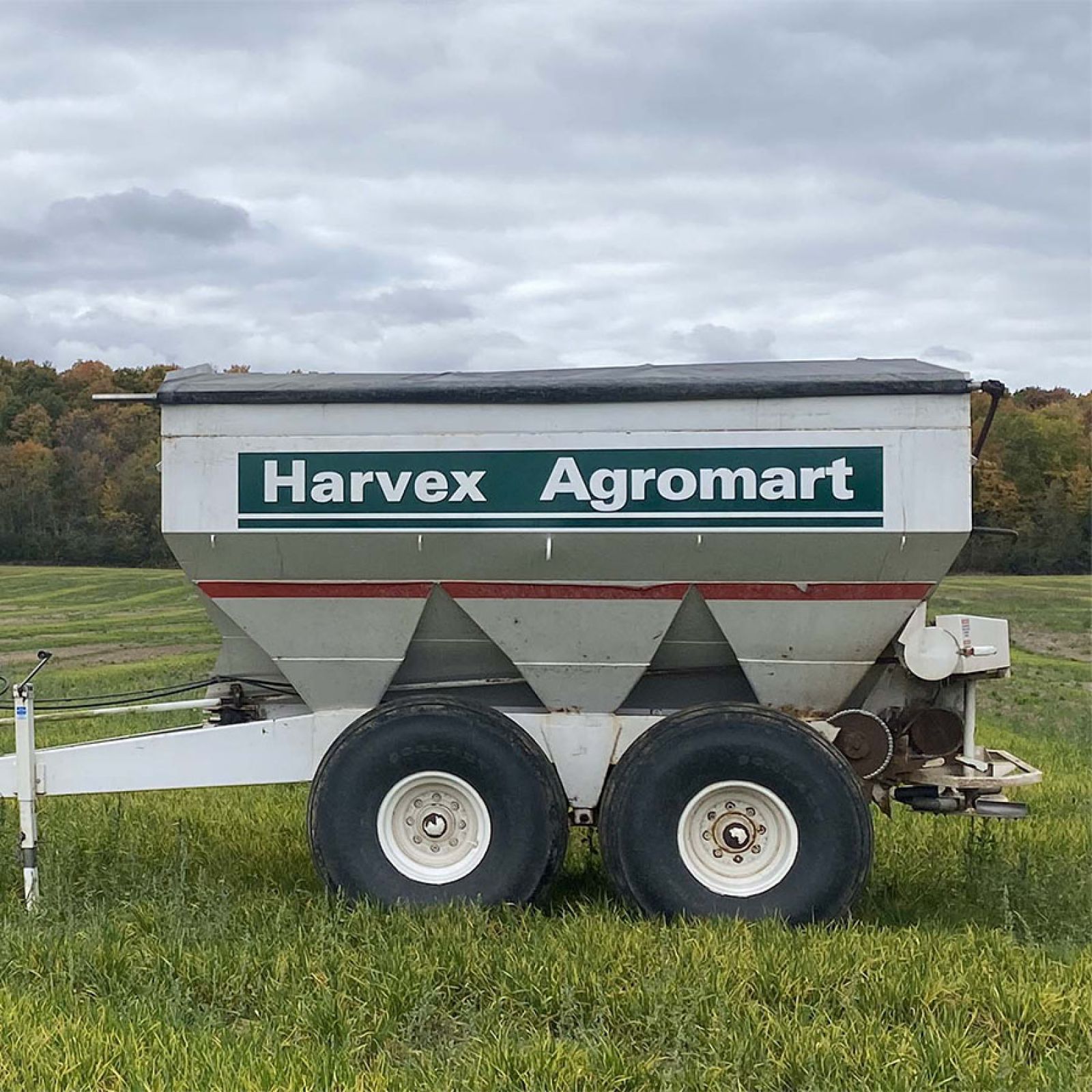Harvex trailer sitting on cropland
