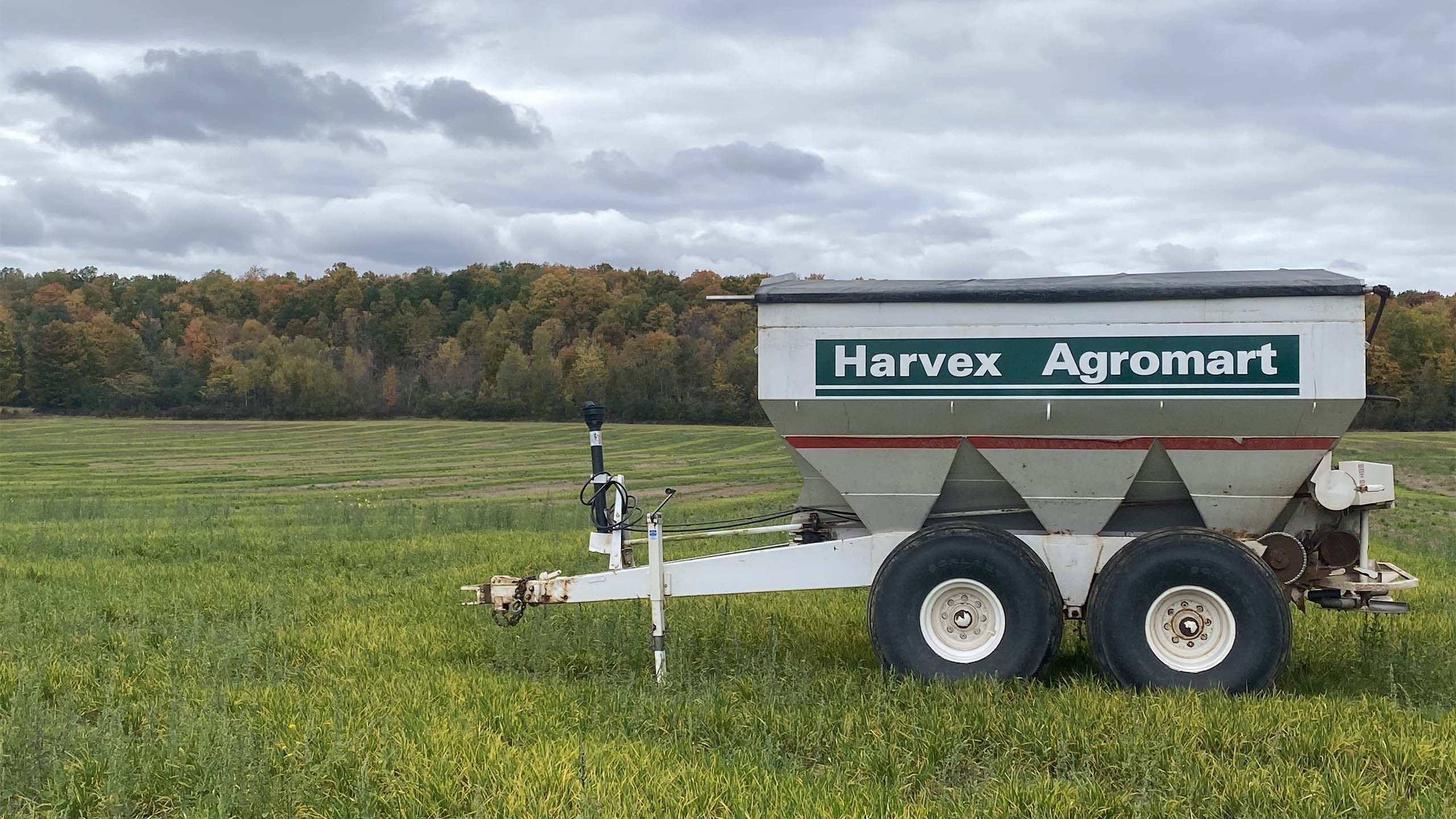 Harvex trailer sitting on cropland